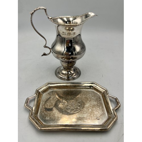 908 - Silver cream jug London 1970, and a small dish with Yorkshire rose Sheffield 1971. Total weight 139g... 