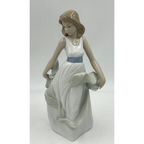 314 - Ten Nao figurines by Lladro to include: 419 Flowers from my Garden, 02001691 My Dearest Girl, 0236 C... 