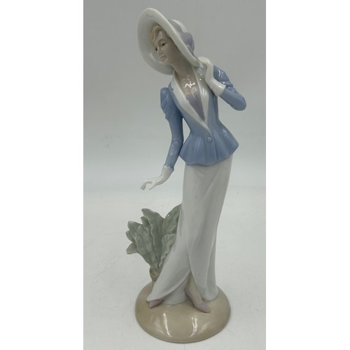 314 - Ten Nao figurines by Lladro to include: 419 Flowers from my Garden, 02001691 My Dearest Girl, 0236 C... 