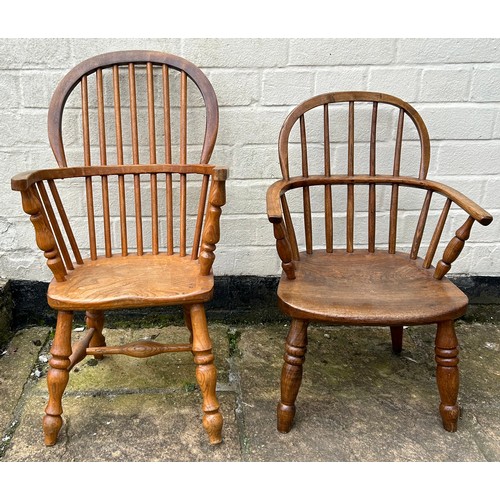 104 - Two children's Windsor chairs, an early 20thC oak and a later pine. The tallest one, pine 66.5 h x 3... 