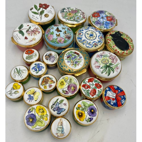 447 - Twenty three Crummles enamel pill boxes.