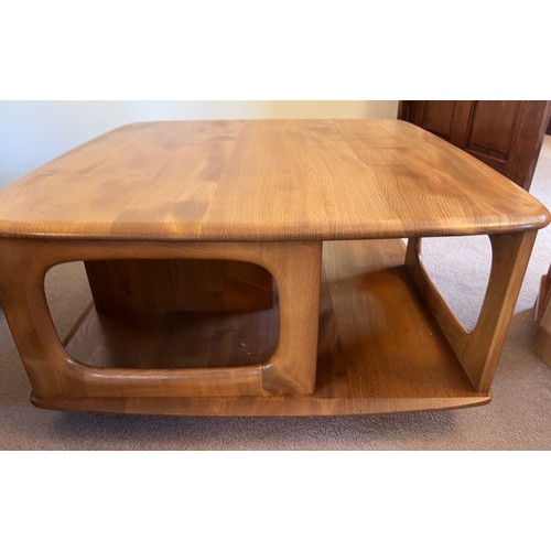 106 - Ercol coffee table with two drawers on wheels. 80cm x 80cm x 39cm h.