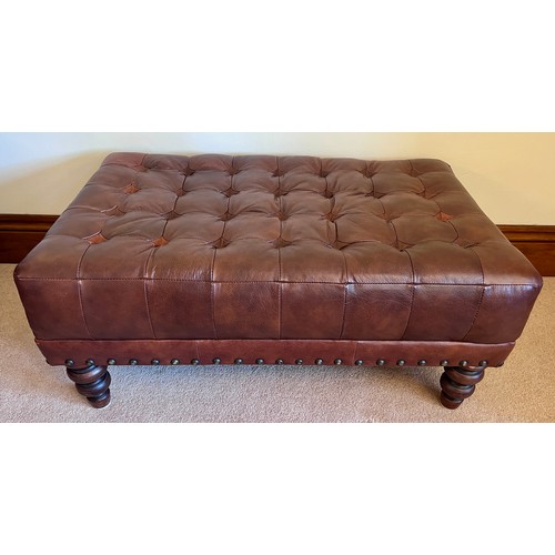 107 - Brown leather footstool. 85cm w x 55cm d x 38cm h.