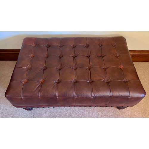 107 - Brown leather footstool. 85cm w x 55cm d x 38cm h.