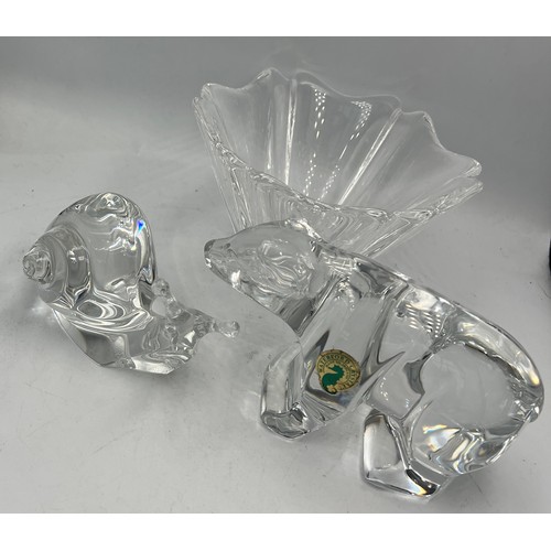 476 - Four pieces of glass to include Baccarat snail, Waterford polar bear, Orrefors bowl and a biscuit ba... 