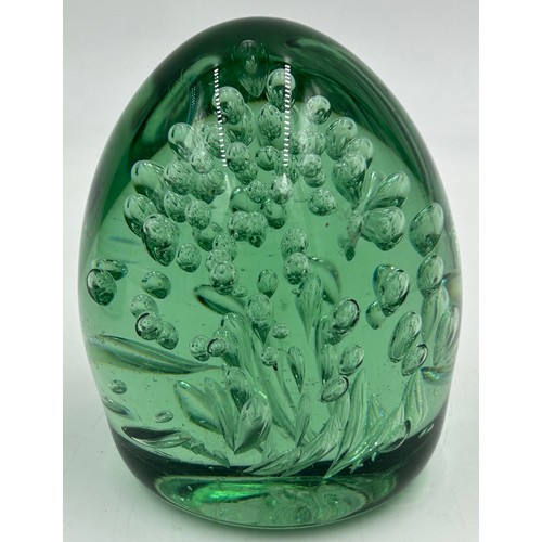 478 - A Victorian glass dump 10cm h together with a blue and green glass vase in the style of Whitefriars ... 