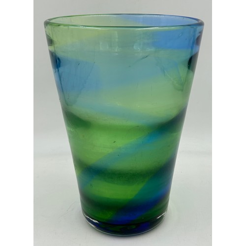 478 - A Victorian glass dump 10cm h together with a blue and green glass vase in the style of Whitefriars ... 