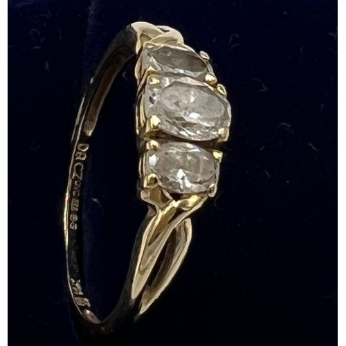 672 - A QVC 14 carat gold ring set with three CZ. Size P. Weight 2gm.