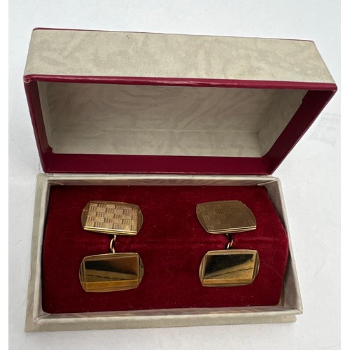 676 - A pair of nine carat gold cufflinks in original presentation box. Total weight 5.4gm.