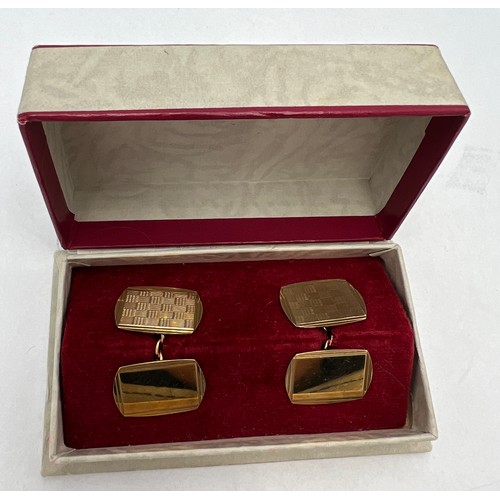 676 - A pair of nine carat gold cufflinks in original presentation box. Total weight 5.4gm.