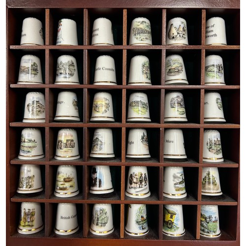 448 - A large collection of approx. 360 thimbles to include 20 x Royal Crown Derby, 42 x Royal Worcester, ... 