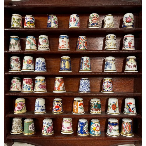 448 - A large collection of approx. 360 thimbles to include 20 x Royal Crown Derby, 42 x Royal Worcester, ... 