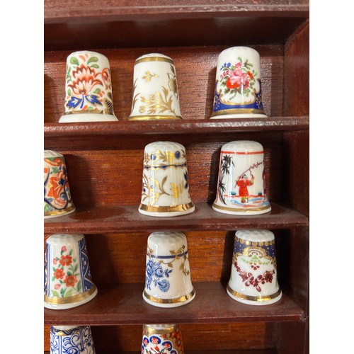 448 - A large collection of approx. 360 thimbles to include 20 x Royal Crown Derby, 42 x Royal Worcester, ... 