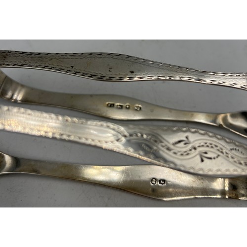 920 - Two pairs of bright cut Georgian silver sugar nips. Peter and Jonathan Bateman and Sheffield 1799, m... 