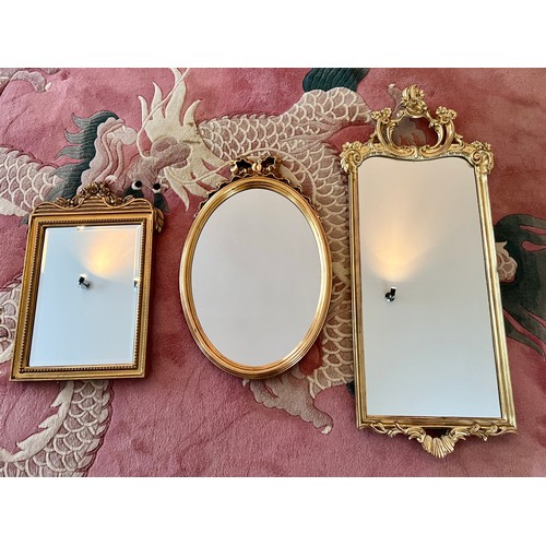 1153 - Three contemporary gilt framed wall mirrors. Largest 97cm x 37cm.