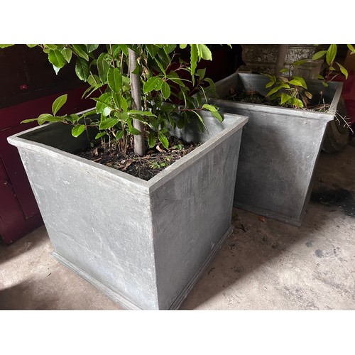 5 - Two good quality faux lead garden planters. Each 54 x 54 x 52cm h.