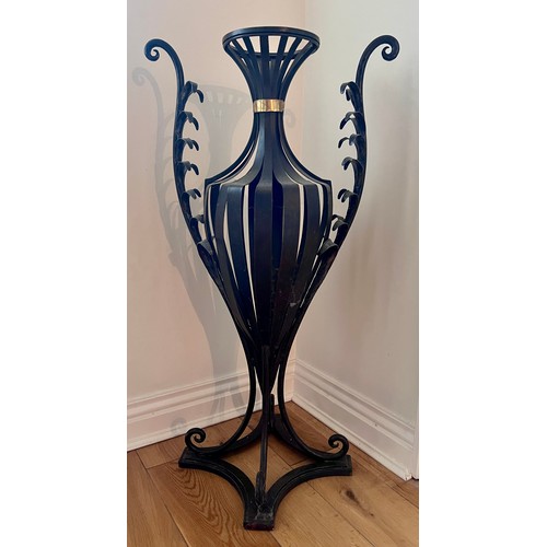 1347 - A 20thC floor standing metal vase sculpture. 83cm h x 44cm w.