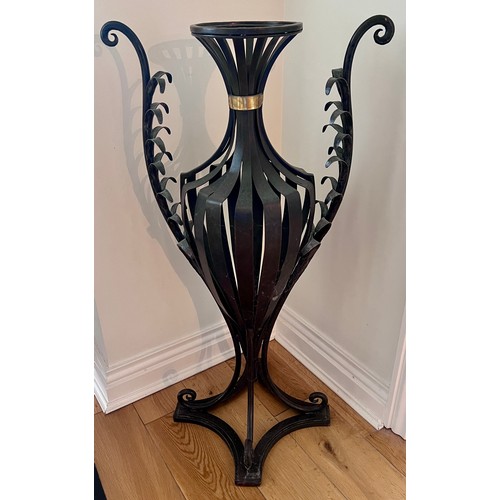 1347 - A 20thC floor standing metal vase sculpture. 83cm h x 44cm w.