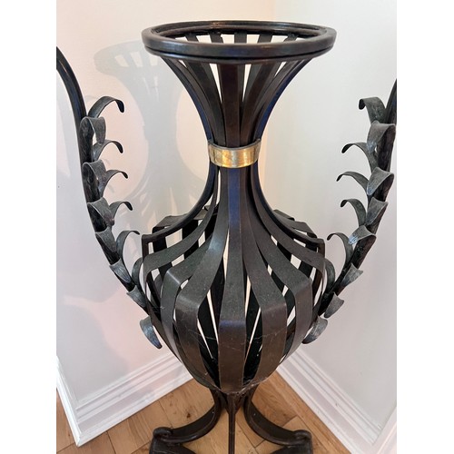 1347 - A 20thC floor standing metal vase sculpture. 83cm h x 44cm w.