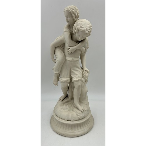 334 - English 19thc ceramics to include a 19thC Parian figure of a boy with a girl upon his back on a rock... 