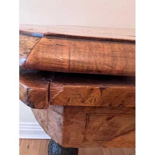 123 - A 19thC burr walnut fold over card table on ceramic castors with baize lined interior. 72cm h x 96cm... 