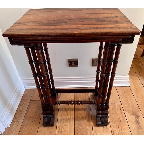 124 - A nest of three rosewood tables. Tallest 71cm h x 50cm w x 37cm d.