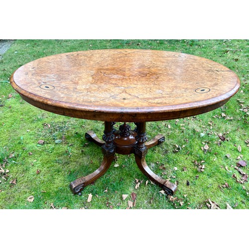 134 - A 19thC oval walnut and inlaid table 72cm h x 114cm w x 78cm d.