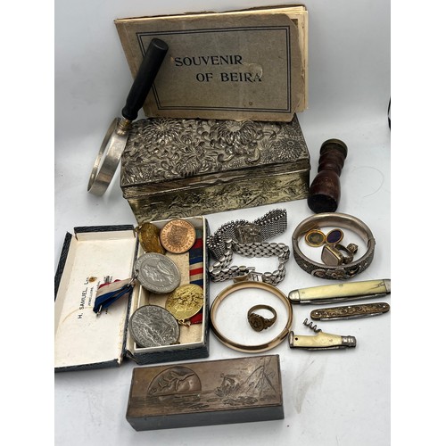 1350 - A miscellany to include hallmarked silver bracelet, two unmarked white metal bangles, 19thC seals, C... 