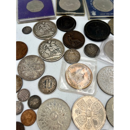 835 - A quantity of coins to include two Victorian crowns, 1887 and 1890, 1797 cartwheel penny, 1977 crown... 