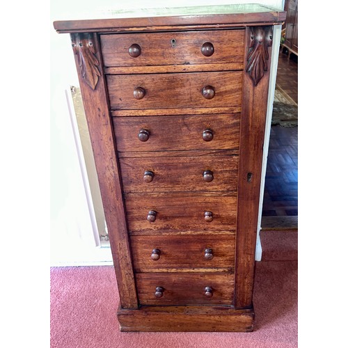 117 - A 19thC mahogany wellington chest of drawers. 48cm w x 34cm d x 103cm h.