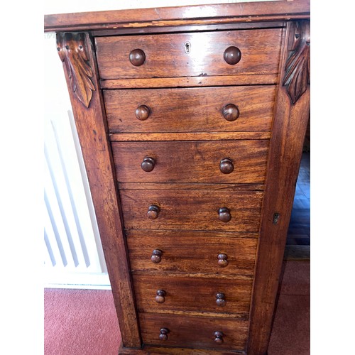 117 - A 19thC mahogany wellington chest of drawers. 48cm w x 34cm d x 103cm h.