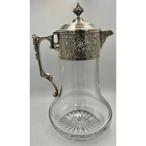 899 - A good quality silver mounted claret jug. London 1998. Maker WW. 29cm h.