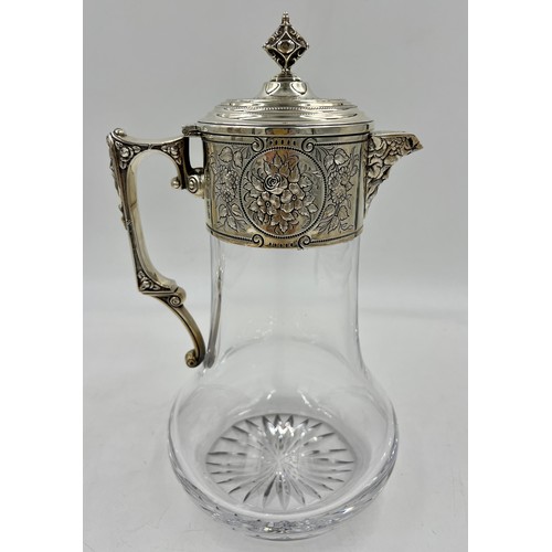 899 - A good quality silver mounted claret jug. London 1998. Maker WW. 29cm h.