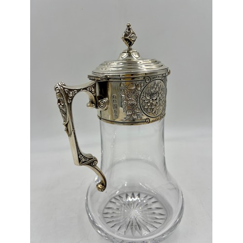 899 - A good quality silver mounted claret jug. London 1998. Maker WW. 29cm h.