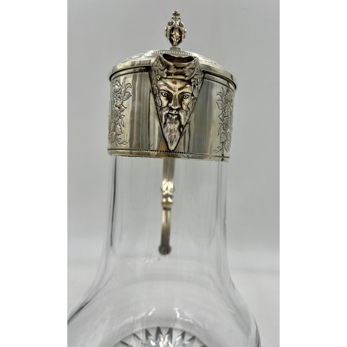 899 - A good quality silver mounted claret jug. London 1998. Maker WW. 29cm h.