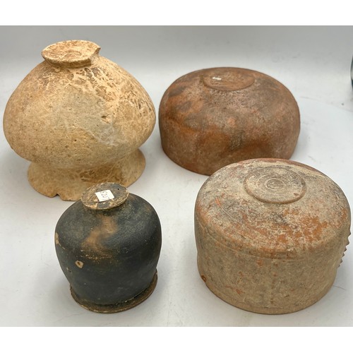 327 - Four old, possibly Roman pottery bowls. Tallest 9cm h.