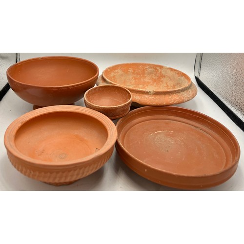 328 - Five various early terracotta bowls. Largest 18cm d.