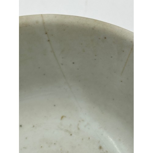 329 - A Chinese Tek Sing Shipwreck white bowl 16.5cm d x 8cm h along with an amethyst glass vase 17cm. (2)... 