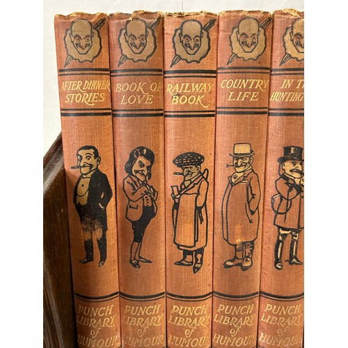 1348 - A Punch Library of Humour, 24 volume set on a vintage oak book trough together with 2 x Maelzel maho... 