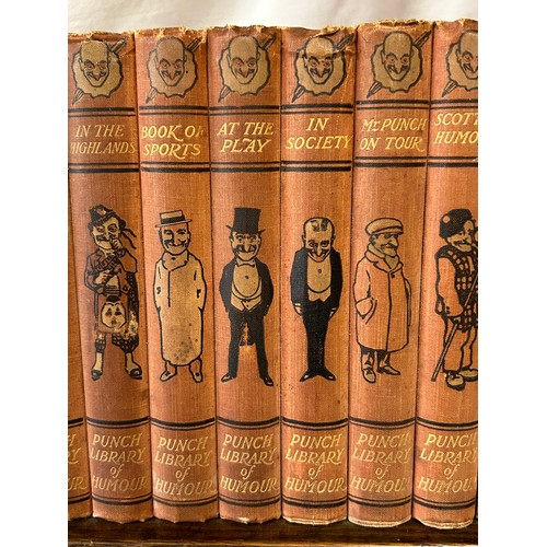 1348 - A Punch Library of Humour, 24 volume set on a vintage oak book trough together with 2 x Maelzel maho... 