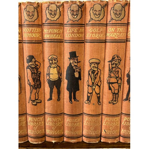 1348 - A Punch Library of Humour, 24 volume set on a vintage oak book trough together with 2 x Maelzel maho... 