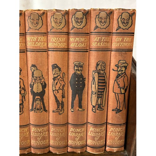 1348 - A Punch Library of Humour, 24 volume set on a vintage oak book trough together with 2 x Maelzel maho... 