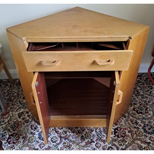 114 - A mid 20thC G Plan E Gomme corner cupboard with secretaire drawer to top. 80cm h x 70cm w x 65cm d.