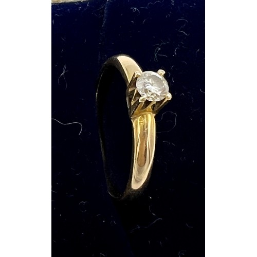 626 - A yellow metal solitaire diamond ring, size K. Weight 1.9gm.