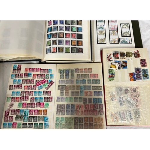 829 - An accumulation of GB and World Stamps both mint and used  to include four albums of GB stamps, the ... 