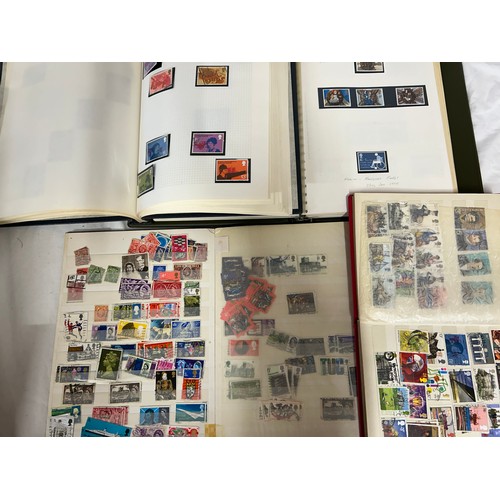 829 - An accumulation of GB and World Stamps both mint and used  to include four albums of GB stamps, the ... 