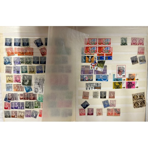 829 - An accumulation of GB and World Stamps both mint and used  to include four albums of GB stamps, the ... 