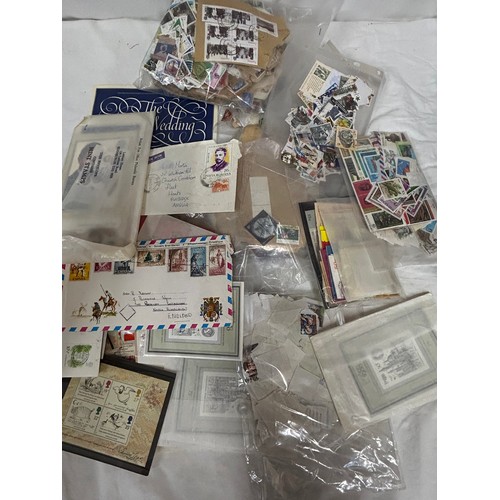 829 - An accumulation of GB and World Stamps both mint and used  to include four albums of GB stamps, the ... 