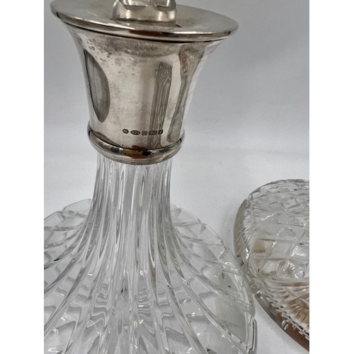 470 - Three silver necked cut glass decanters to include Sheffield 2008.