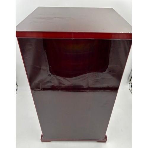 1356 - A lacquered wood humidor cabinet with a glazed door enclosing seven cigar trays and a hygrometer con... 